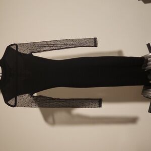 Almost Famous Black Dress with Sheer Polka Dot Sleeves